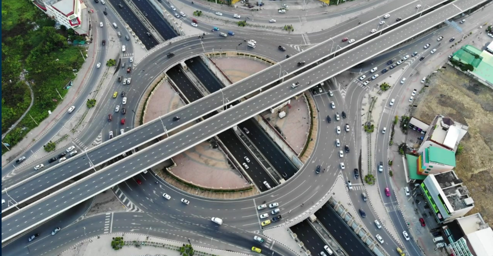 An aerial view of a crowded highway interchange illustrates the complexity of fundraising operations.