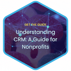 A hexagon-shaped graphic with a blue border shows the text: GET THE GUIDE Understanding CRM: A Guide for Nonprofits over a background of abstract digital network connections.
